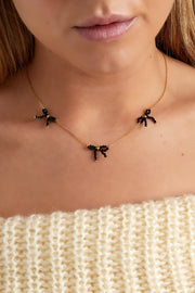 Ketting dames goud met zwarte strikjes LoveSieraden