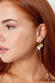 Oorbellen met zon bedel zilver stainless steel LoveSieraden