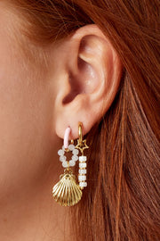 Gouden oorbellen ster en witte kralen stainless steel LoveSieraden