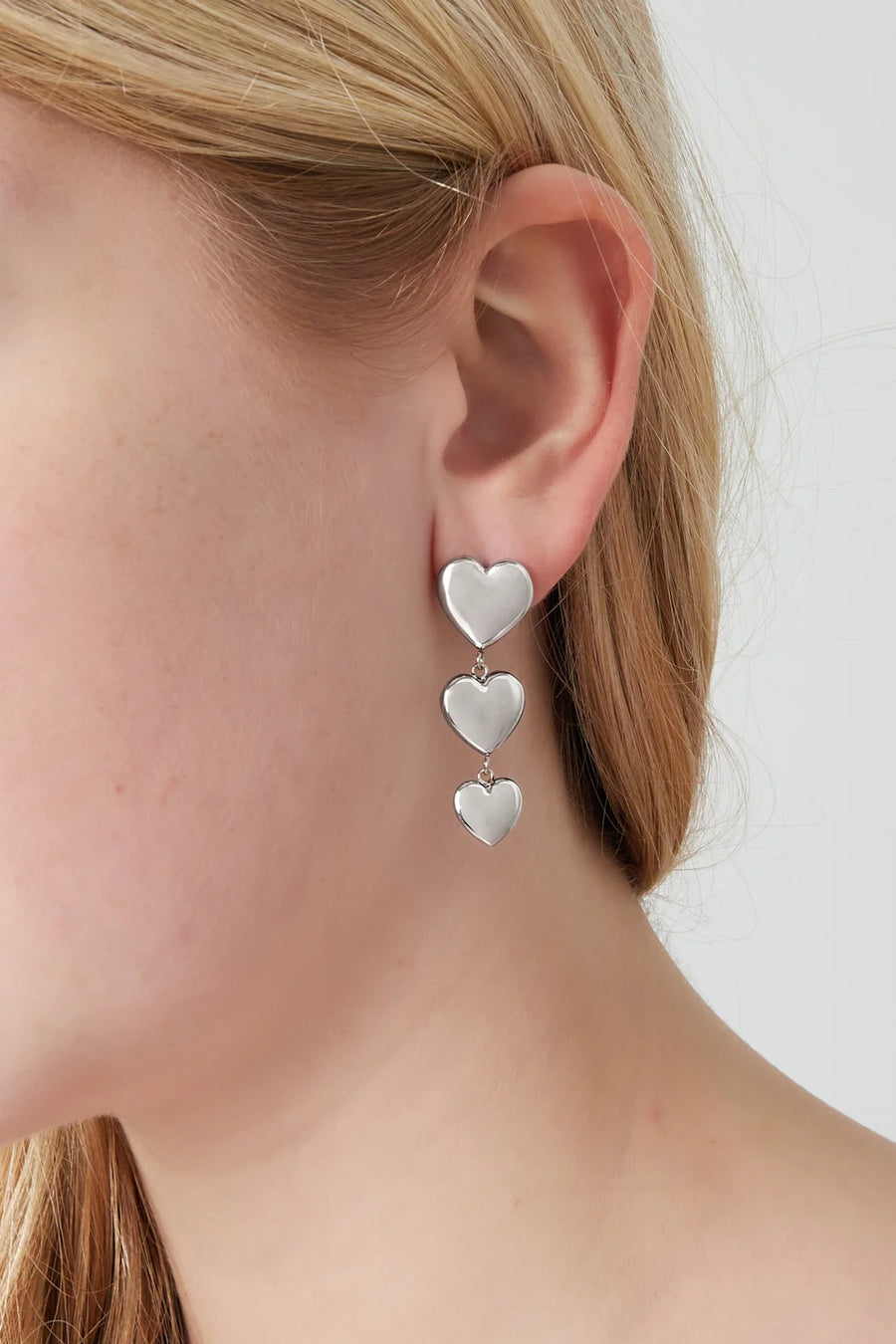 Oorbellen goud drie harten stainless steel LoveSieraden