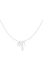 zilveren ketting met bedels hoefijzer