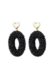 Oorbellen goud hartje en ovalen vorm zwarte kralen LoveSieraden