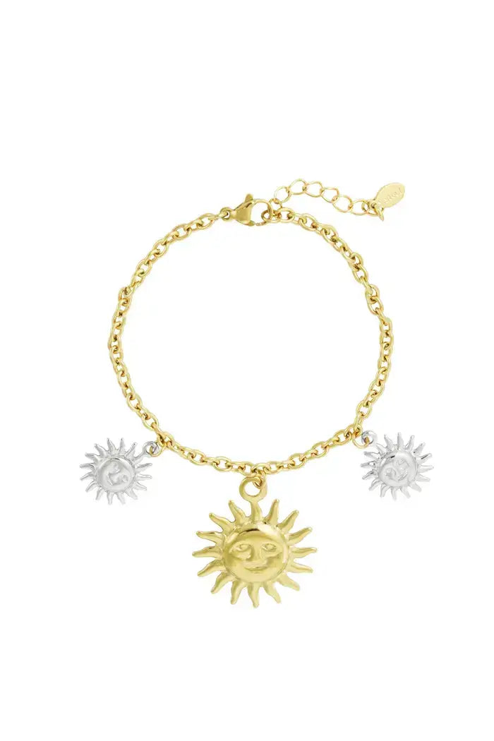 armband met drie zonnebedels goud en zilver
