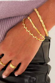 Armband dames kleine bloemen platte schakels model