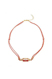 Ketting eye will met roze touw - LoveSieraden