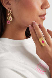 Oorbellen goudkleurig met roze of paarse hanger model2