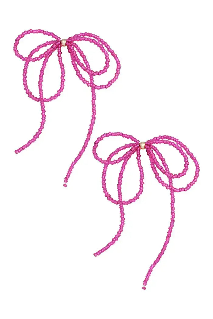 Oorbellen grote strik gekleurde kralen fuhsia