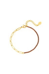 Schakelarmband dames goud lila zirkonia steentjes