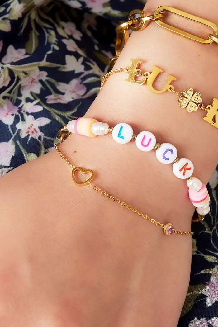 Armband goud met de tekst ‘luck’ - LoveSieraden