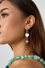 Zilveren oorbellen met hartje van schelp LoveSieraden